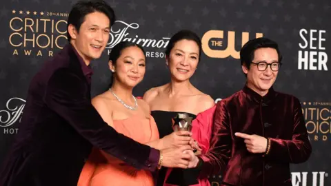 Getty Images Harry Shum Jr., Stephanie Hsu, Michelle Yeoh, and Ke Huy Quan