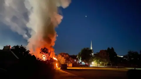 Marty Sweeney smoke and flames from the Green Street fire