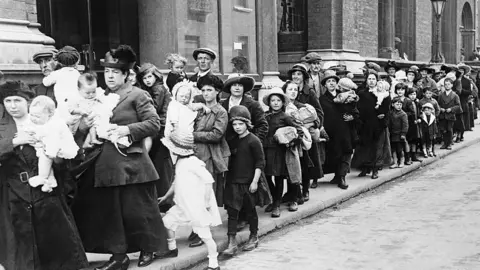 Getty Images Ongoing sectarian violence in Belfast forces refugees to flee, including these people in Dublin