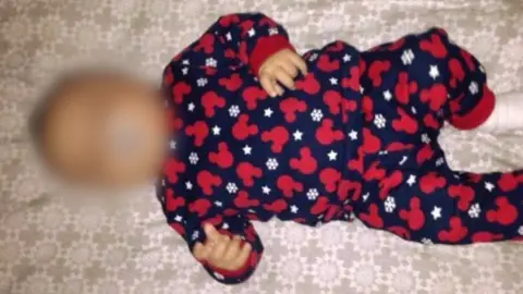 Handout Baby of woman supported by Pause Project