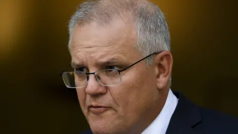 EPA Australian Prime Minister Scott Morrison speaks to the media during a press conference at Parliament House in Canberra, Australia, 16 February 2021.