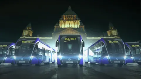 Department of Infrastructure Glider busses outside City Hall in Belfast