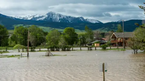 Getty Images The rains were caused by historic rainfall and snowmelt in the region