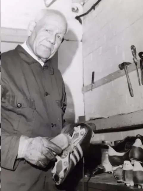 Leslie family Jack Leslie cleaning boots at West Ham