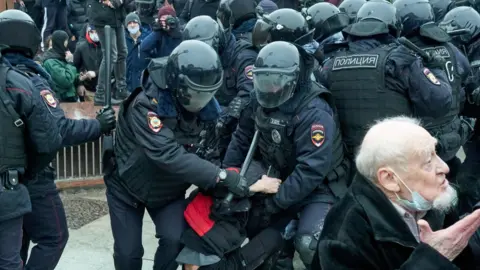 Getty Images A man is detained in Moscow on 23 Jan 2021