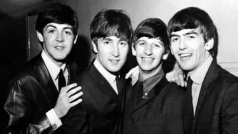 PA Media The Beatles in July 1965