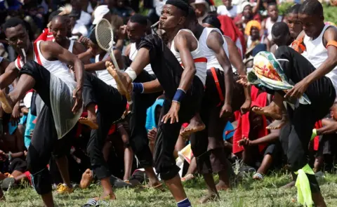 Rogan Ward/Reuters Dancers perform during the Ingoma yase eMaChuwini annual dance competition held in eMaChuwini, Msinga, South Africa - Friday 29 December 2023