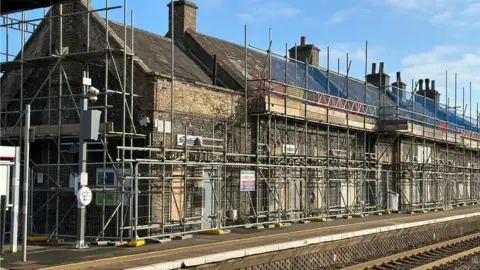 Anna Louise Claydon/BBC Brandon station surrounded by scaffolding