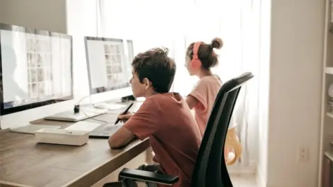 Getty Images Children on computers