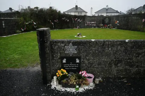 Reuters A memorial plaque at the Tuam graveyard where the bodies of 796 babies were uncovered