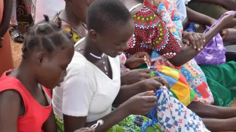 Pachamama Project Two young people smiling