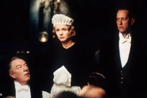 Getty Images Actors (L to R) Michael Gambon, Emily Watson and Richard E. Grant appear in a scene from the film "Gosford Park."