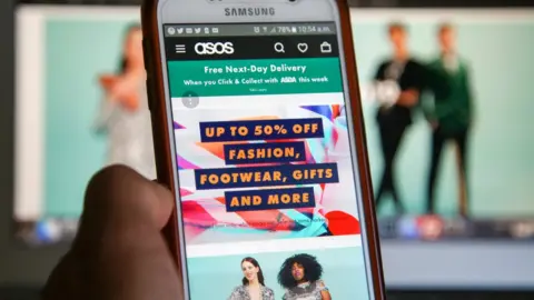 Getty Images ASOS on a mobile phone