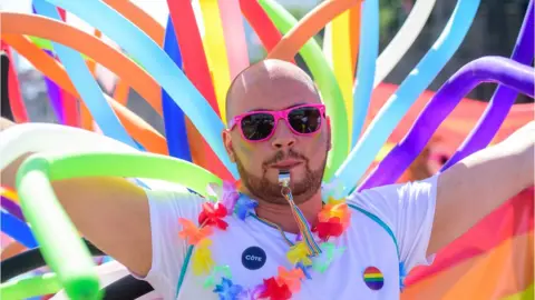 Mark Lewis A man enjoying Pride