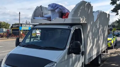 Cambs Police Lorry after it became wedged under a bridge