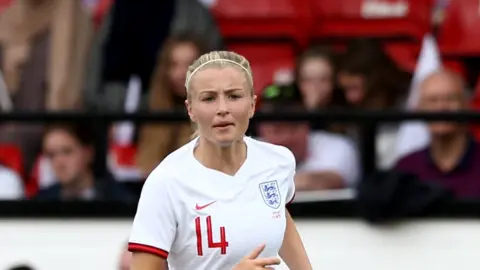Getty Images Leah Williamson in action for England in a friendly