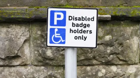 Getty Images Blue badge sign