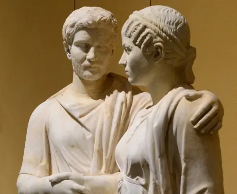 Getty Images Statue of man and woman in the Torlonia Collection