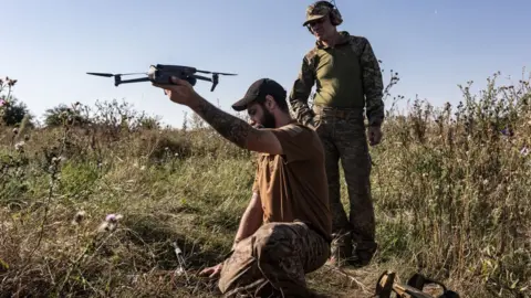 Getty Images A Ukrainian soldier prepares a drone as the Russia-Ukraine war continues in Donetsk Oblast, Ukraine, 17 August 2023