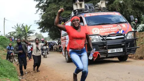 Getty Images A Bobi Wine supporter at a presidential rally in Uganda, November 2020