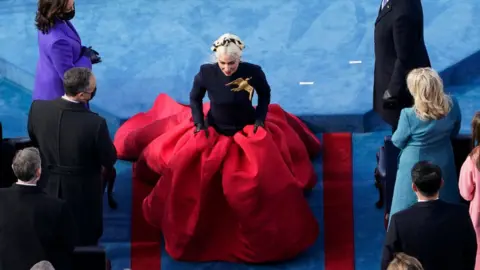 Getty Images Lady Gaga walks away during the 59th presidential inauguration