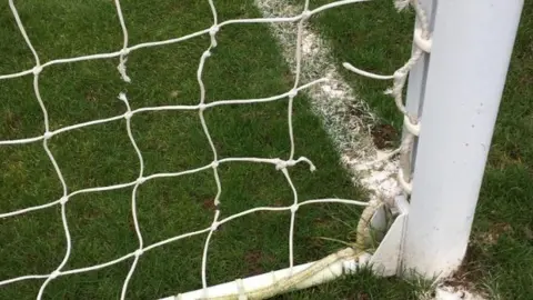 Alan Burge Football net damaged by rabbits