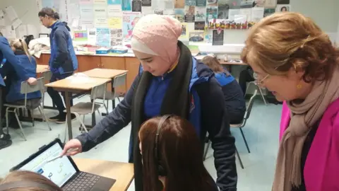 BBC Language teacher and Syrian students