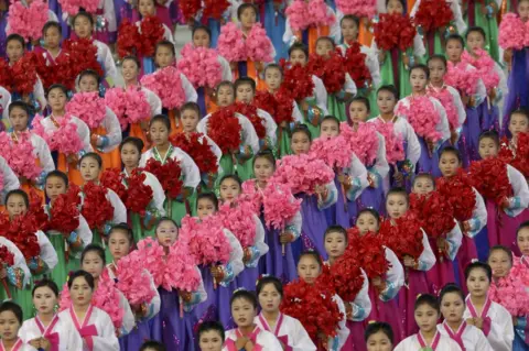 PYONGYANG PRESS CORPS / EPA North Koreans perform during an event, as part of the Inter-Korean summit, at the May Day stadium in Pyongyang