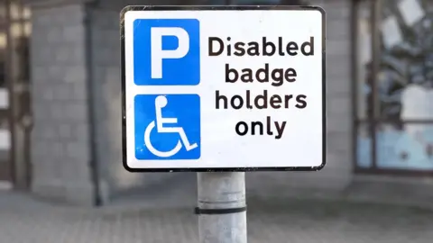 Getty Images Disabled bay sign