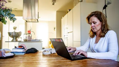 Getty Images A lady working from home