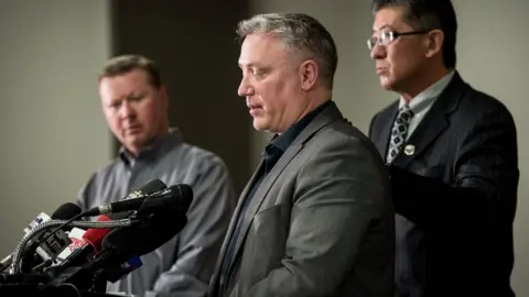 Reuters Humboldt Broncos President Kevin Garinger and President of the SJHL Bill Chow (R)