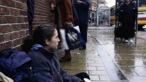 Getty Images Homeless people on street