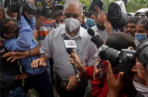 Getty Images CBI and forensic officials outside Sushant Singh Rajput's house in Mumbai