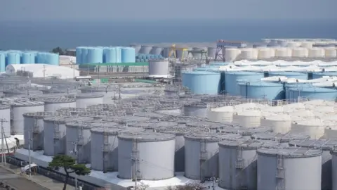 Jiro Akiba/BBC Tanks holding treated water at the Fukushima plant