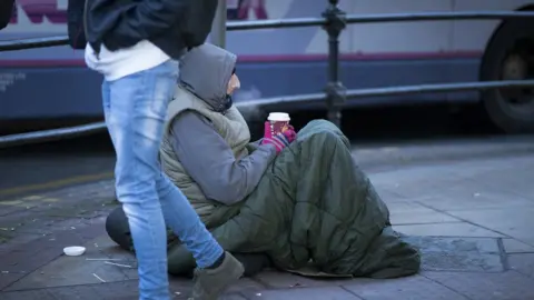 Getty Images Manchester beggar