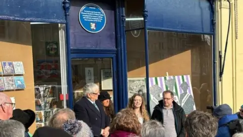 Crowds gathered on Friday outside the North Yorks Art School shop, in St Nicholas Cliff, Scarborough