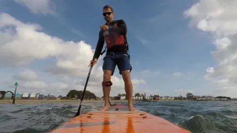 BBC David Haze paddleboarding