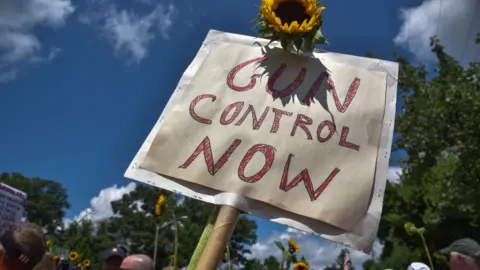 Getty Images A demonstration on the street in front of the National Rifle Association headquarters in Fairfax, Virginia, on Saturday, August 4, 2018