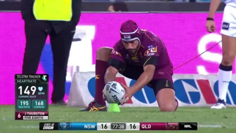 NRL Rugby player Johnathan Thurston about to take a kick
