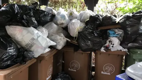 Alan Brewer Bins in Sutton overflowing with rubbish in 2018