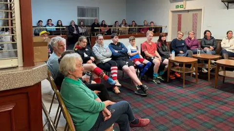 Emlyn Hockey Club members hold a crisis meeting at Cardigan Rugby Club