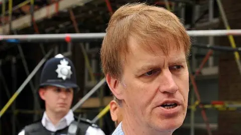 Getty Images Stephen Timms leaving hospital in May 2010