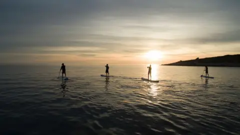 Getty Images Paddleboarders