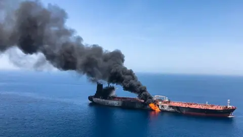 Reuters Oil tanker on fire following an attack in the Gulf of Oman on 13 June
