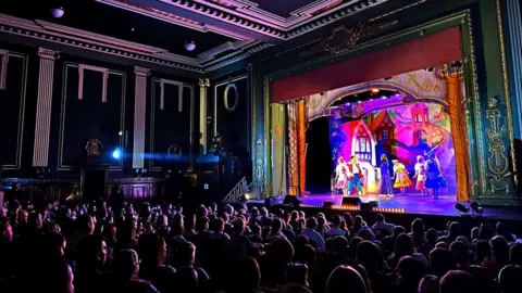 David Munn Inside Epstein Theatre during a show