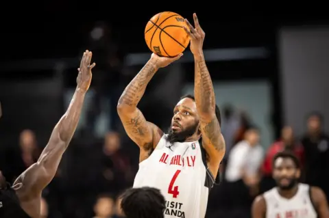 NACER TALEL/GETTY IMAGES Kevin Murphy of Al Ahly Ly shoots the ball during the game against the City Oilers, during the Nile Conference Group play for the 2024 Basketball Africa League season.