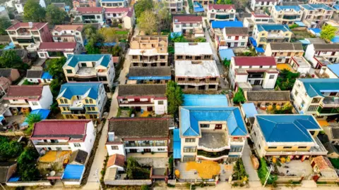 Getty Images An aerial photo taken of the hometown of Xu Jiayin, chairman of Evergrande Group, in Jutaigang Village, Gaoxian Township, Taikang County, Zhoukou city, Henan Province, China.