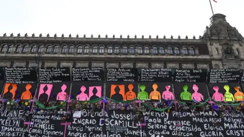 Getty Images An impromptu memorial for the victims of femicides in Mexico, IWD 2021