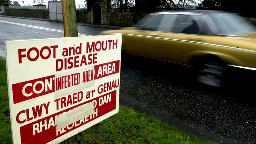 PA Media A warning sign on Anglesey in 2001