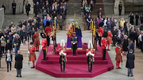 PA Media King Charles III and his siblings stand vigil in Westminster Hall